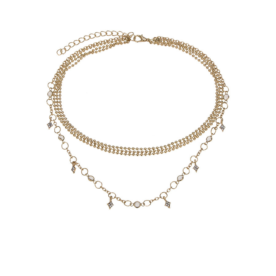 Multi-layered diamond star pendant necklace